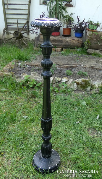 Old church candle holder made of wood
