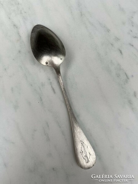 Marked silver spoon