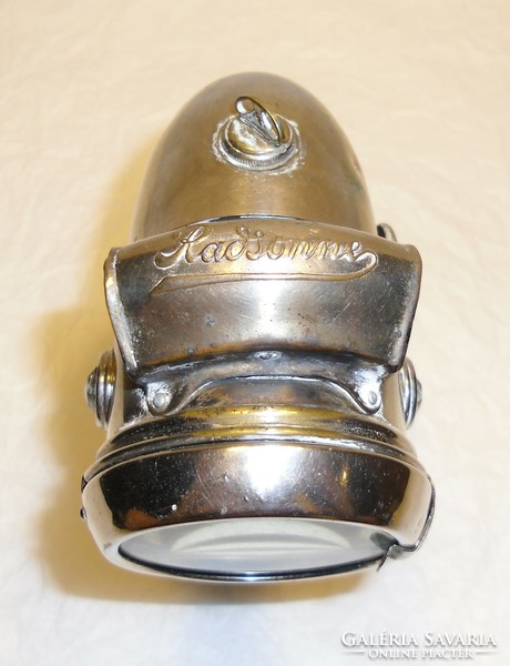 Old carbide bicycle lamp.