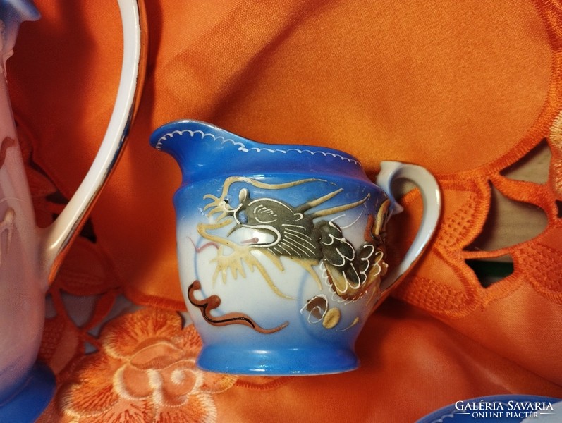 Japanese porcelain coffee set with a dragon pattern