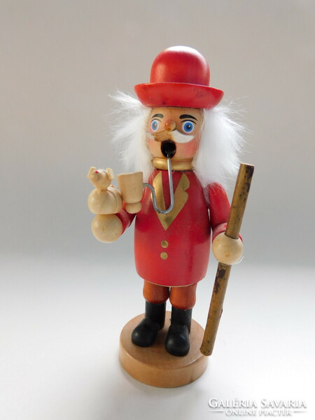Vintage wooden man - with a wandering bird playing a pipe 13 cm