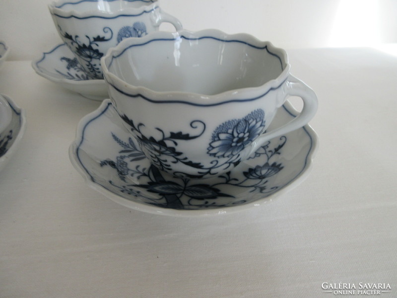 Old, marked, Meissen twisted-handled teacups, with coasters. Negotiable!