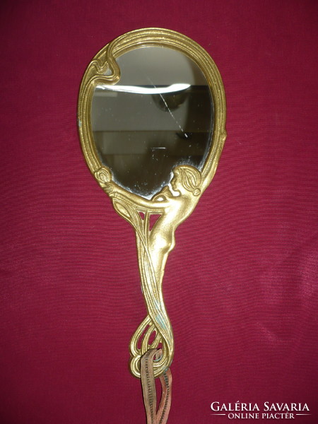 Copper-framed hand mirror, old copper-framed bathroom mirror with a female figure