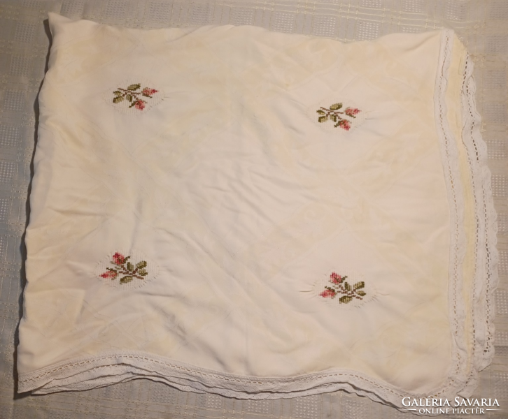Old embroidered rose tablecloth