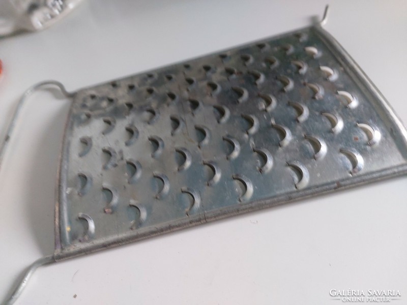 A beautiful and useful object, a file with a larger hole in a fish scale pattern