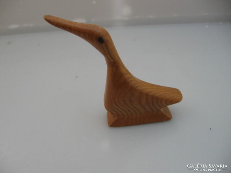 Small carved wooden bird