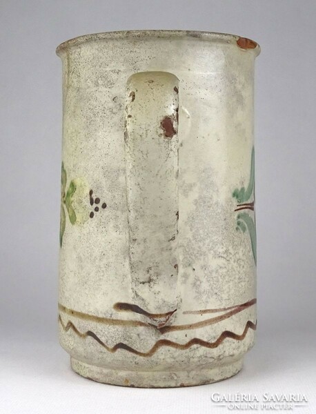 1Q627 old painted earthenware jug with flower decoration 18.5 Cm