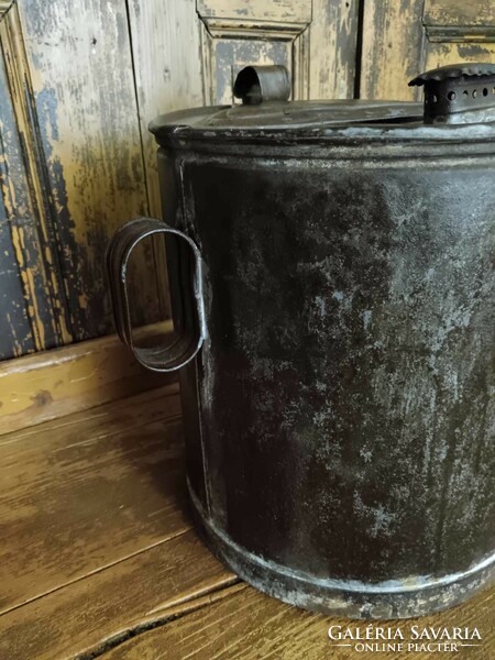On a large tin grease can, at least 20 liters, piece with patina, grease storage with a chimney, as a decoration