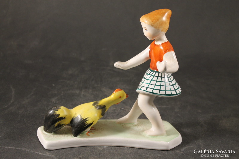 Porcelain girl with a rooster 851