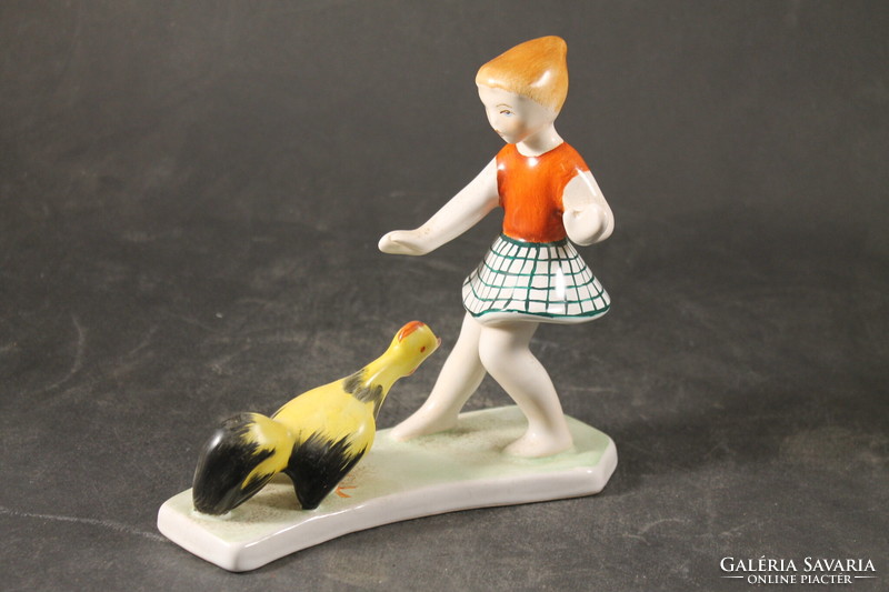 Porcelain girl with a rooster 851