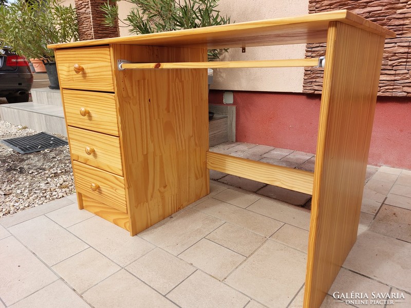 For sale is a 4-drawer pine desk with pull-out shelf. Furniture is beautiful, in like-new condition. Dimensions: 1