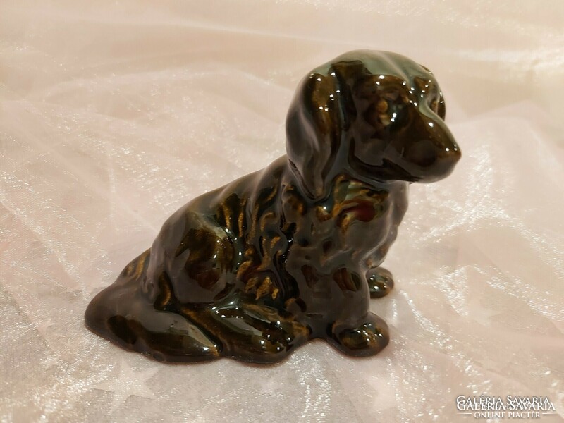 Ceramic dachshund figure.