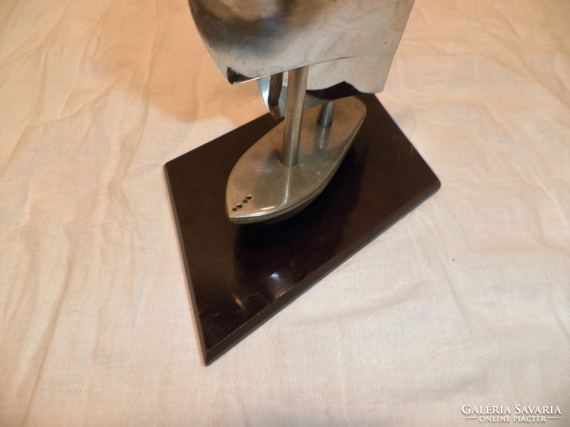 Old sailboat on vinyl pedestal