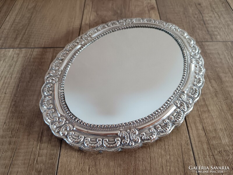 Old silver framed wall mirror