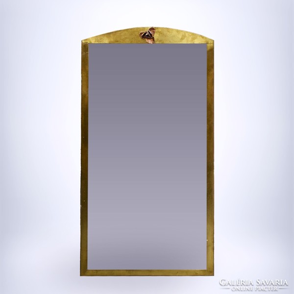 Wall mirror with a copper frame