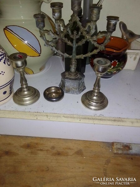 A small pond and 2 candle holders