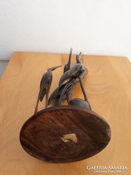 Carved heron family from horn