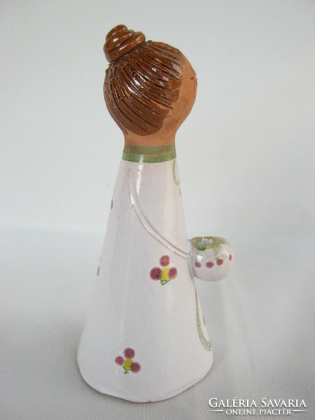 Ceramic girl with candle holder