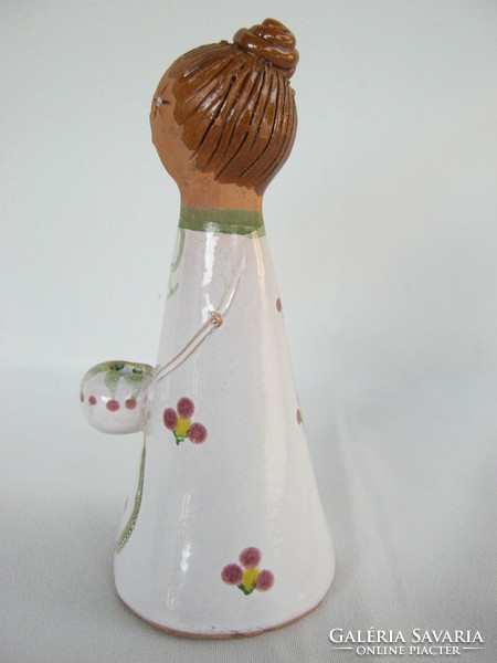 Ceramic girl with candle holder