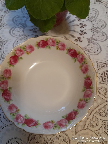 Pink salad, garnished porcelain bowl.