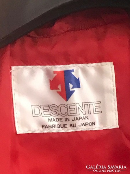 Very soft, lined, beautiful women's jacket. Descente made in Japan with front zip and button-up hood.