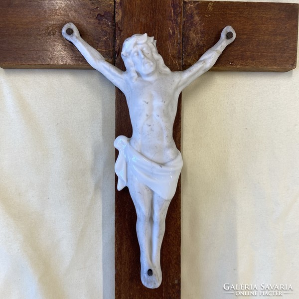 Antique crucifix with porcelain Jesus