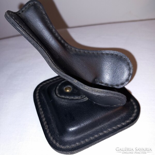 Single, leather, table pipe holder.