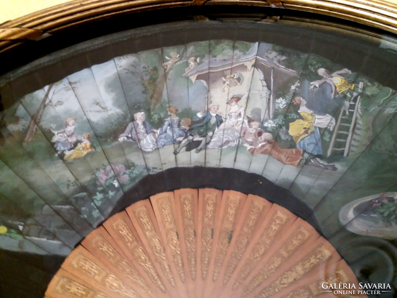 Hand-painted fan from the 19th century, in a gilded frame, under glass