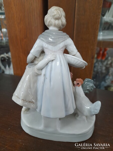 German, Germany Limbach 1913-1920 porcelain figure portrait of a mother feeding poultry with her child. 14.5 Cm.