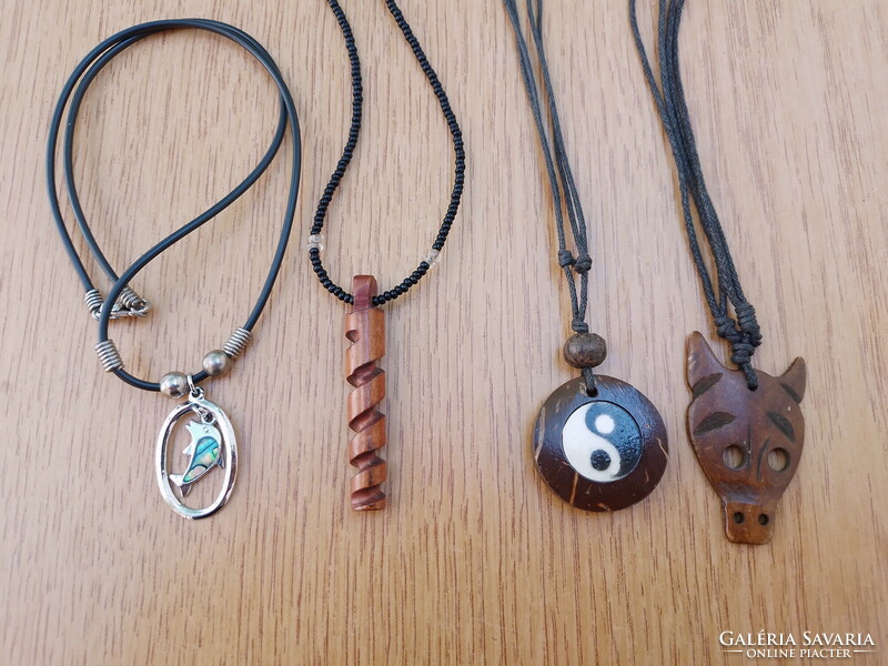 New figurative necklace on leather strap (yin-yang, dolphin, fox, threaded wood)