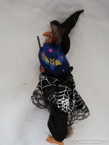 Boszi in a bat-print dress