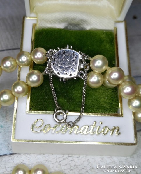 Old pearl necklace with silver switch