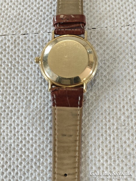 Gold omega automatic wristwatch.