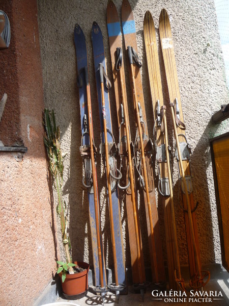 Old wooden skis, poles.