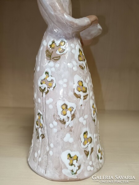 K. M. Monogrammed ceramic lady