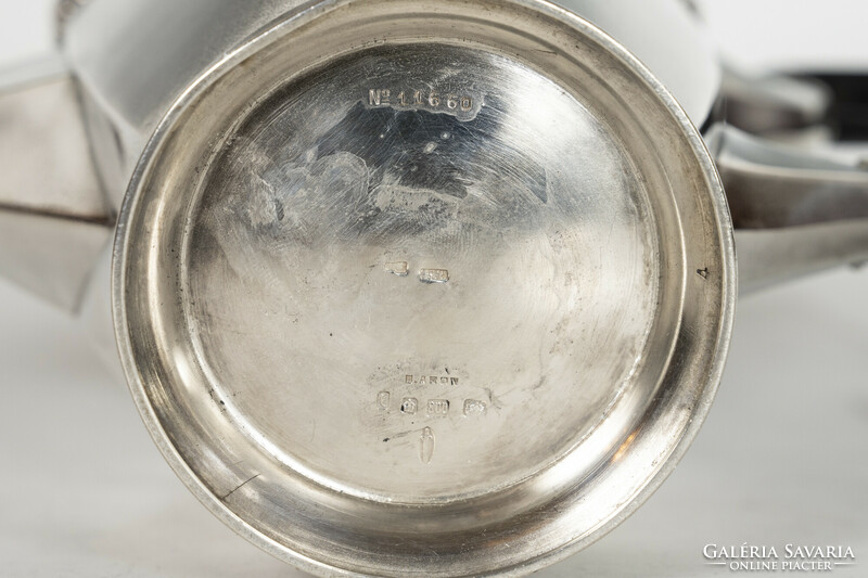 Silver jug / spout with plant frieze decor