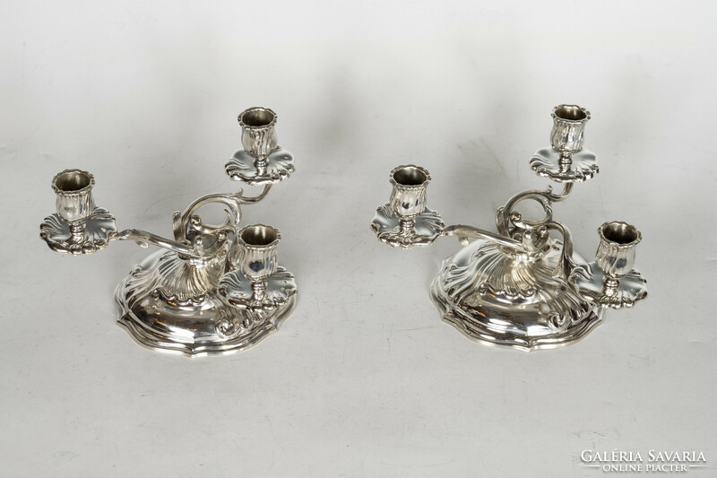 Pair of silver 3-prong candlesticks with stylized tendril decor