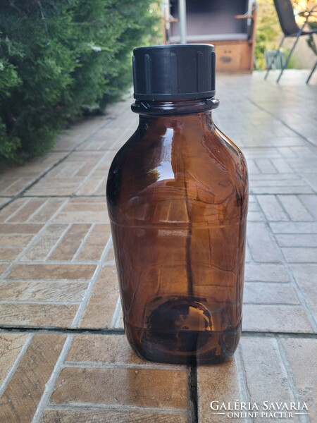 Large amber medicine bottle.