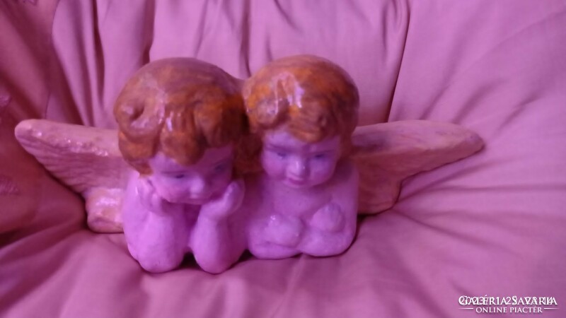 Elbowing sad angels, colorful artificial stone sculpture