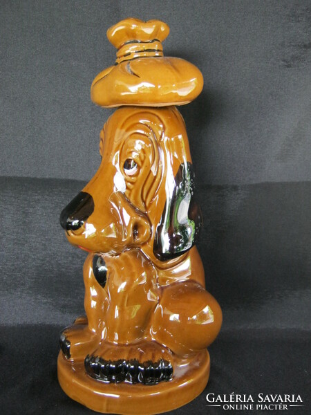 Fun ceramic dog bottle pouring drink offering brandy