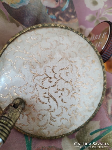 Hand-held cosmetic mirror - in an antique atmosphere