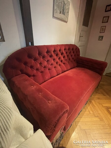 Antique burgundy carved sofa