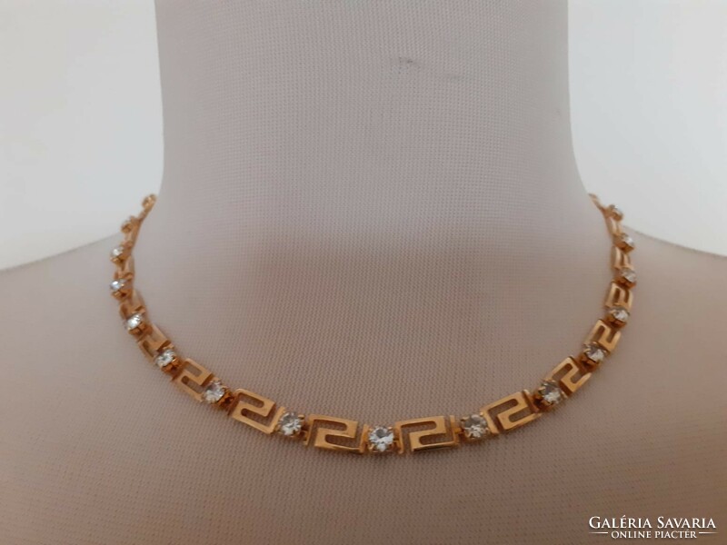 Gold-colored, Greek-patterned avon necklace with earrings