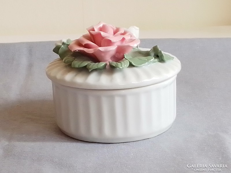 Antique old round porcelain bonbonier, sugar bowl with lid, storage box, plastic rose on the lid