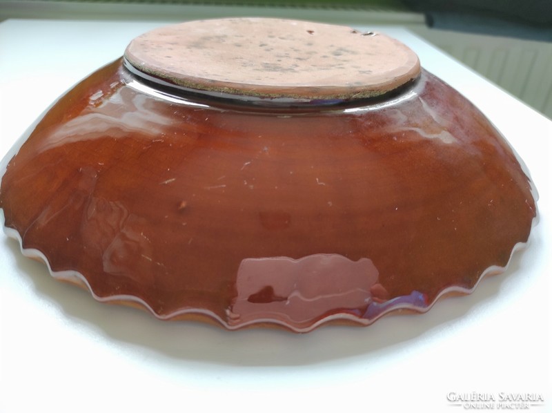 Brown glazed folk ceramic wall bowl