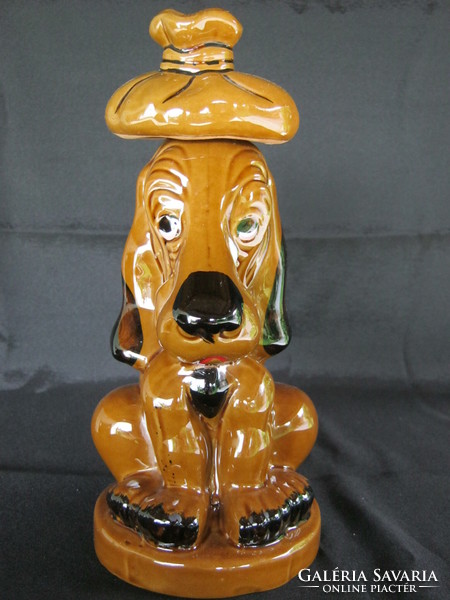 Fun ceramic dog bottle pouring drink offering brandy