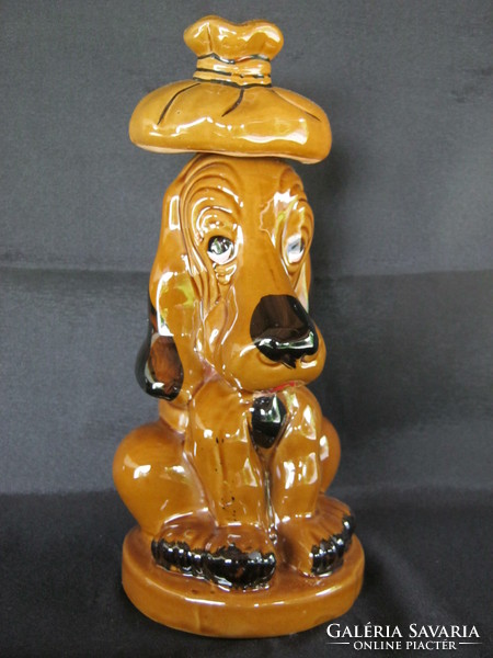 Fun ceramic dog bottle pouring drink offering brandy