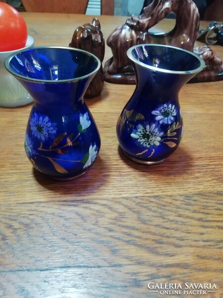 Pair of small blue glass vases in the condition shown in the pictures