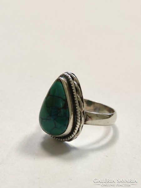 Silver ring with turquoise stone