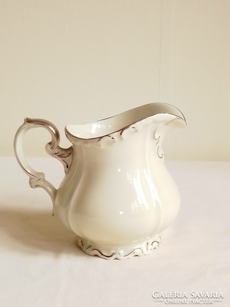 Old bone-colored glazed porcelain pouring jug, feathered with silver, edelstein bavaria Mária Theresia